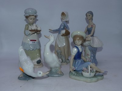 Lot 218 - A Lladro Spanish porcelain figure of a young...