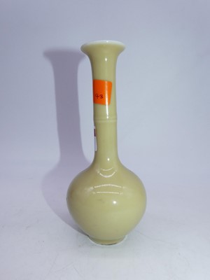 Lot 225 - A Chinese export stem vase, on a pale yellow...