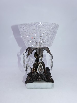 Lot 226 - A table centrepiece, the cut glass bowl raised...
