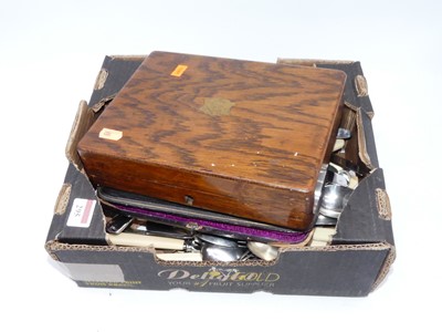 Lot 295 - A box containing a collection of silver plated...