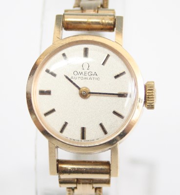 Lot 2524 - A lady's 9ct yellow gold Omega automatic...