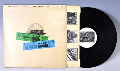 Lot 1041 - The Beatles, a collection of eight LP's to...
