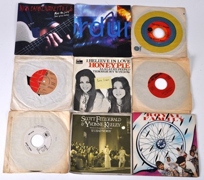 Lot 1037 - A collection of assorted 7" singles, to...