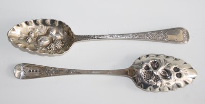 Lot 2146 - A pair of Regency silver berry spoons, the...