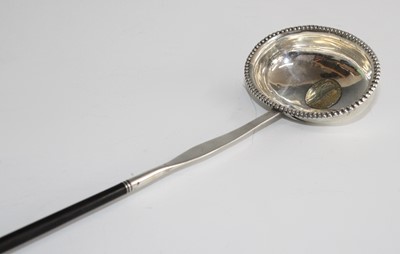 Lot 2135 - A George II/III white metal toddy ladle, the...