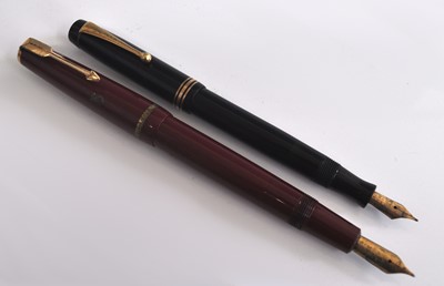 Lot 215 - Two Parker Duofold fountain pens, one being a...