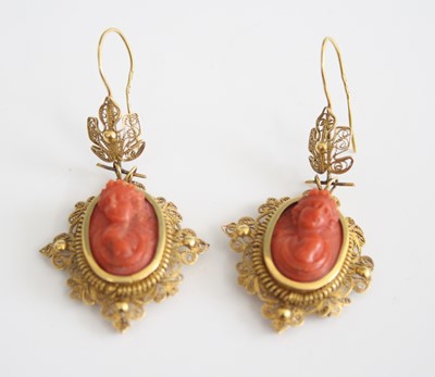 Lot 2526 - A pair of yellow metal carved coral cameo drop...