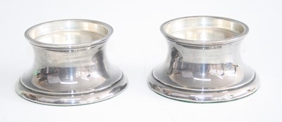 Lot 204 - A pair of contemporary silver candle-holders,...