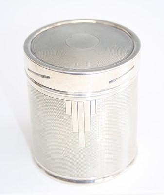 Lot 155 - An early Art Deco silver cylindrical tobacco...