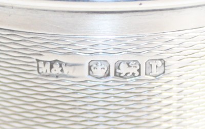 Lot 155 - An early Art Deco silver cylindrical tobacco...