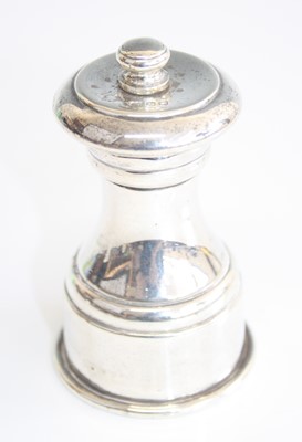 Lot 188 - A circa 1900 silver pedestal pepper mill, of...