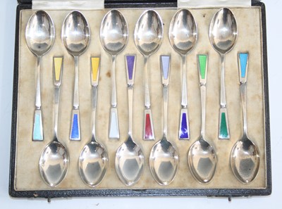 Lot 162 - A cased set of twelve Art Deco silver and...
