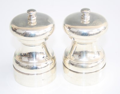 Lot 191 - A pair of contemporary silver salt and pepper...
