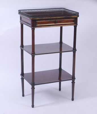 Lot 2616 - A late 19th century French mahogany three-tier...