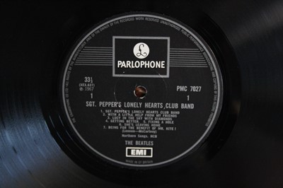 Lot 1143 - The Beatles, a collection of four LP's to...