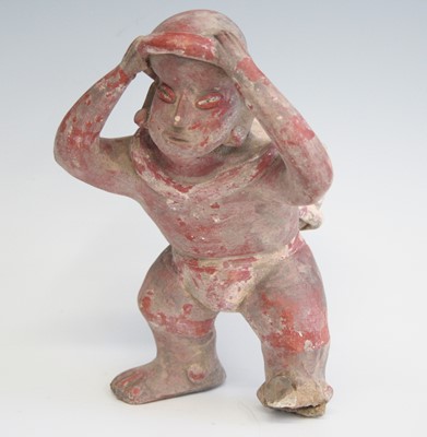 Lot 2382 - A hollow moulded pottery figure, modelled as a...