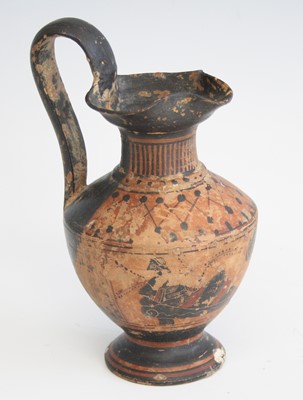 Lot 2375 - A terracotta pottery ewer, of typical form,...