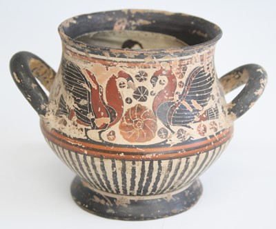 Lot 2369 - A Greek pottery vase, of squat circular form...