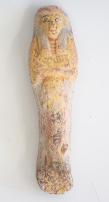 Lot 2365 - An Egyptian pottery shabti, the mummiform...