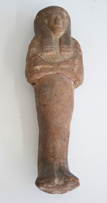 Lot 2363 - An Egyptian moulded and tooled shabti figure,...