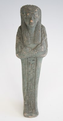 Lot 2360 - An Egyptian green painted pottery shabti...