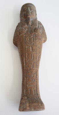 Lot 2361 - An Egyptian moulded and tooled shabti figure,...