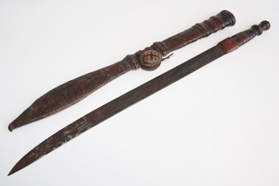 Lot 102 - A North African sword, having a 63cm etched...