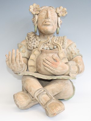 Lot 2378 - A large Mexican pottery figure, modelled as a...