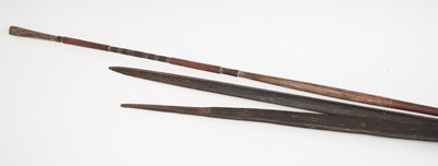 Lot 2386 - A hand carved black palm-wood ceremonial spear,...