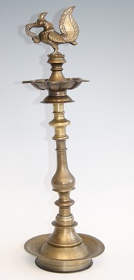 Lot 188 - A cast brass Hindu votive oil lamp, the sconce...