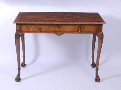 Lot 2625 - A walnut and figured walnut single drawer side...