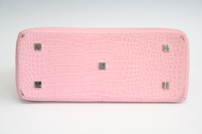 Lot 250 - A Jasper Conran pink-dyed crocodile skin...