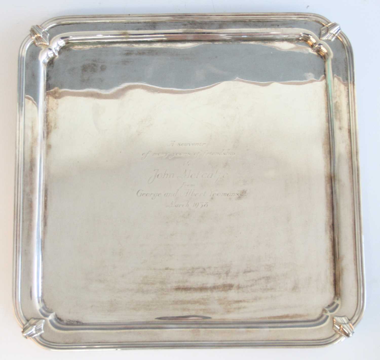 Lot 193 - A large Art Deco silver salver, of square form...