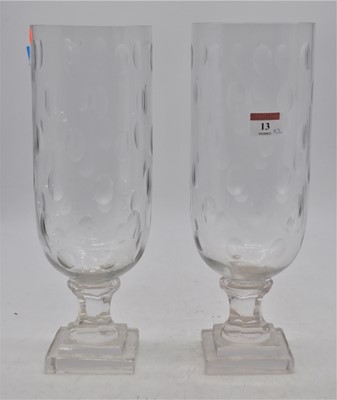 Lot 13 - A pair of contemporary glass hurricane lamps,...