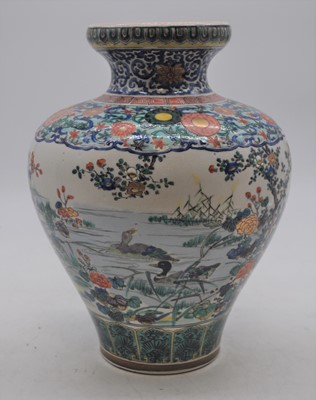 Lot 15 - An early 20th century Japanese earthenware...