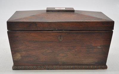 Lot 28 - A Regency rosewood tea caddy, of sarcophagus...