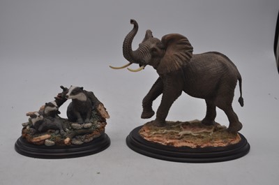Lot 61 - A collection of various resin animal figures...
