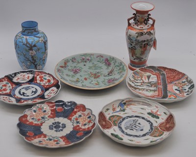 Lot 71 - A collection of eastern ceramics to include an...