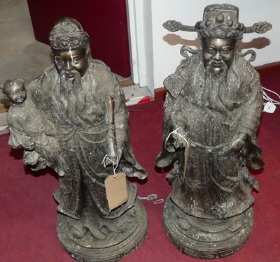Lot 193 - A pair of 20th century Chinese bronze deities...