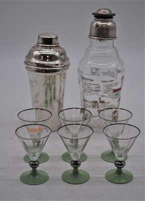 Lot 102 - An electro-plated cocktail shaker, together...