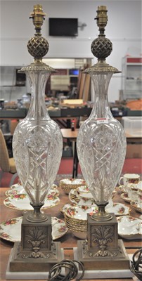 Lot 104 - A pair of 20th century brass and cut glass...