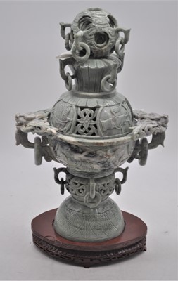 Lot 111 - A jadeite furnace having puzzle ball finial...