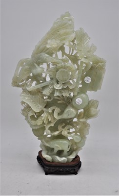 Lot 113 - A jadeite carving of a flower vase and cover,...