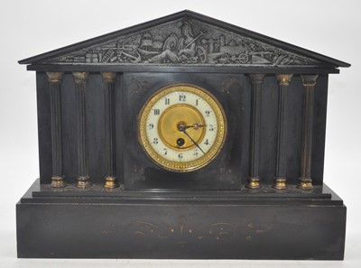 Lot 128 - A Victorian black slate mantel clock of...