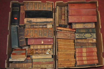 Lot 142 - Two boxes of vintage books to include leather...