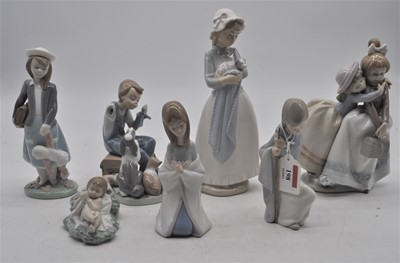 Lot 198 - A collection of six Lladro porcelain figures,...