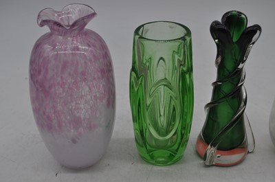 Lot 194 - A collection of coloured glass vases, the...
