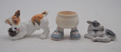 Lot 162 - A Royal Doulton model of a puppy 7cm high,...