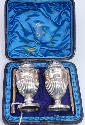 Lot 185 - A pair of Victorian silver pepperettes, each...