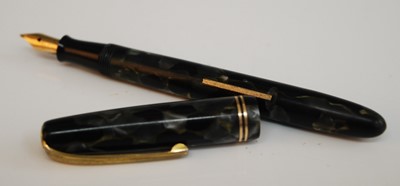 Lot 223 - A circa 1950s Burnham fountain pen, in marbled...